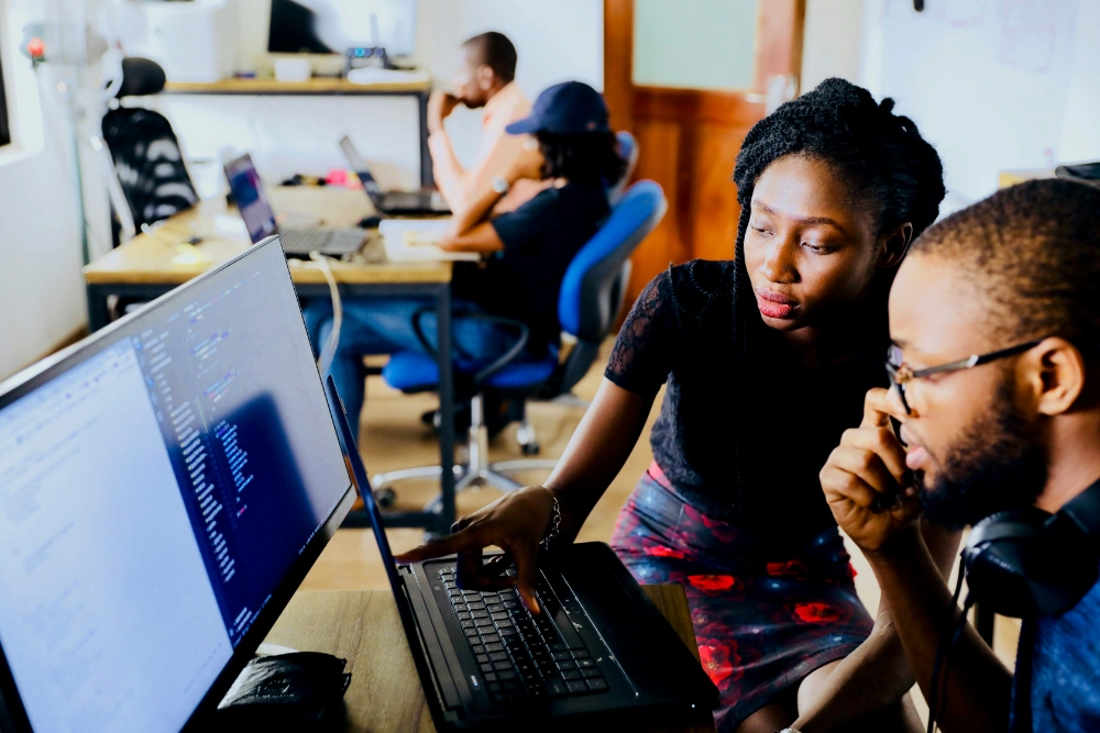 Students in mentorship session with industry professionals